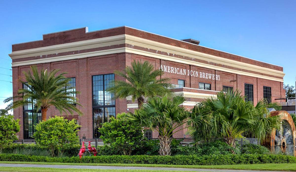 american icon brewery exterior with palms