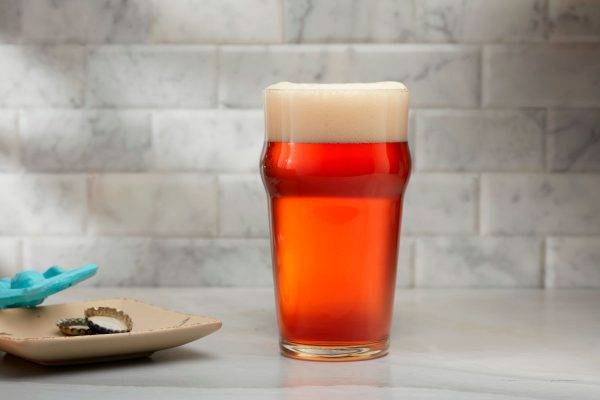 red/amber-colored beer in a glass