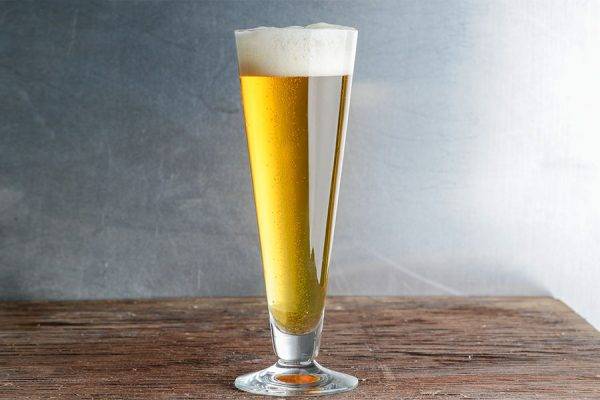 pale beer in a tall glass