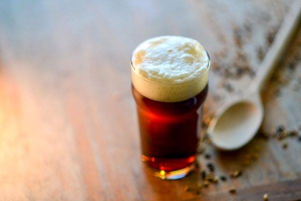 brown beer in a pint glass