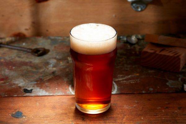 copper-colored beer in pint glass