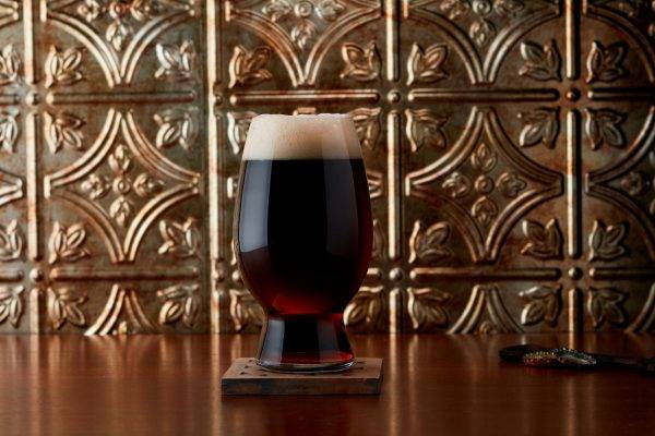 dark brown beer in a glass