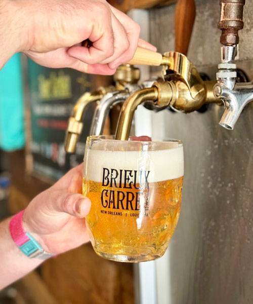 stein being filled at brieux carrex taproom